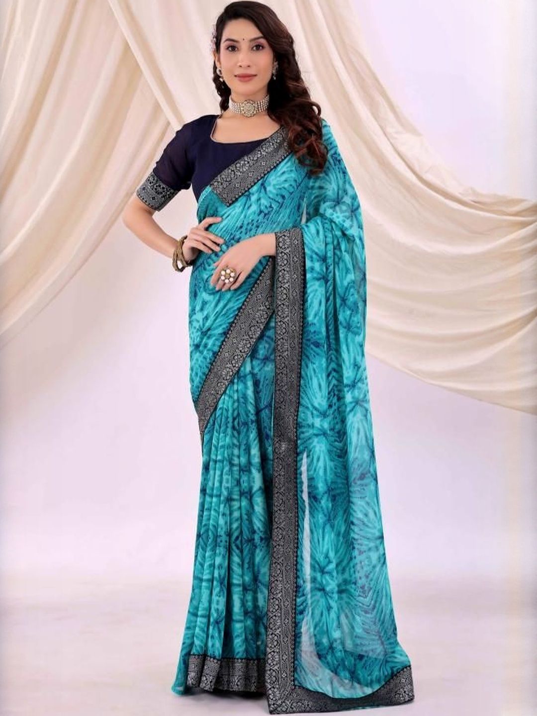 Dhimhi Women's Turquoise Blue Pure Georgette Printed Sarees