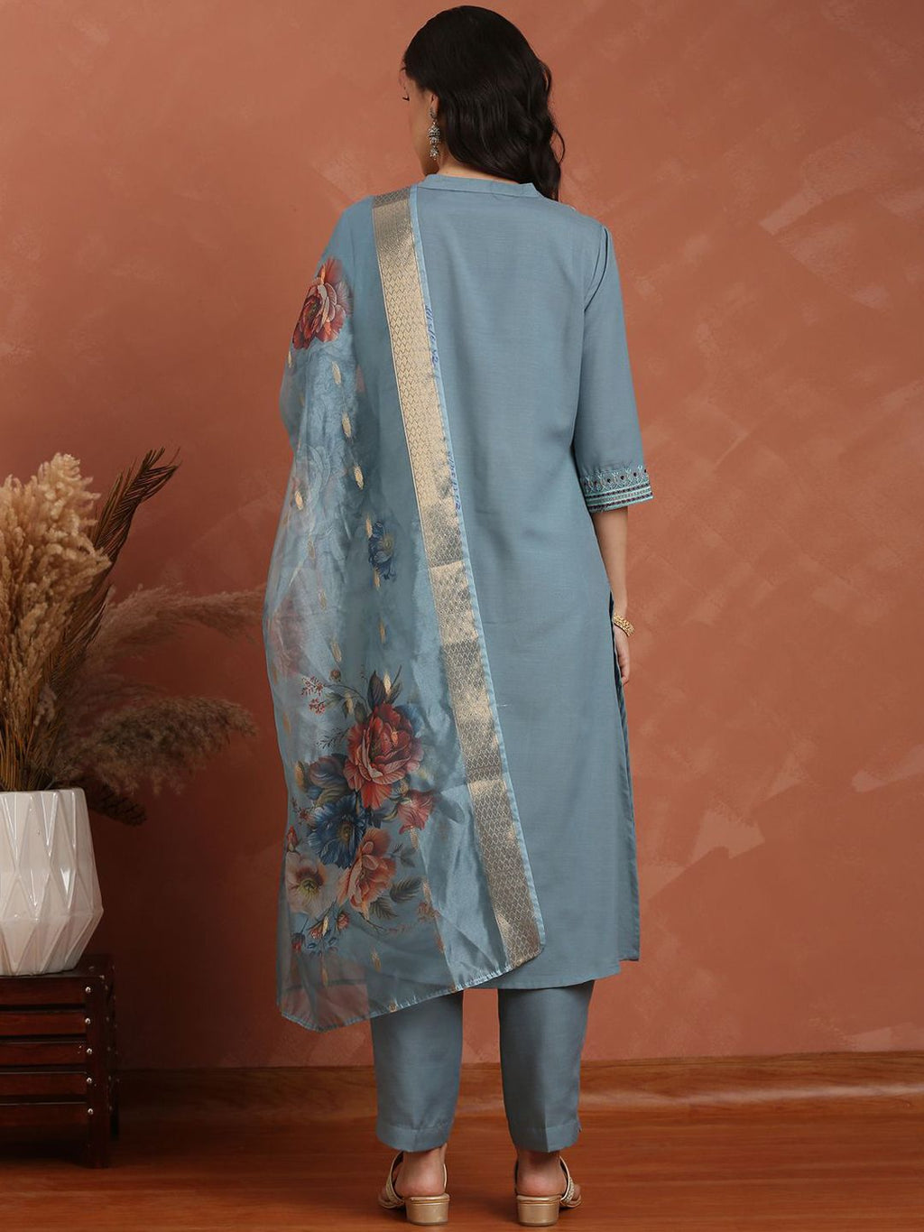 Dhimhi women's floral embroidered kurta set with trousers and dupatta, featuring regular thread work and vibrant floral patterns.