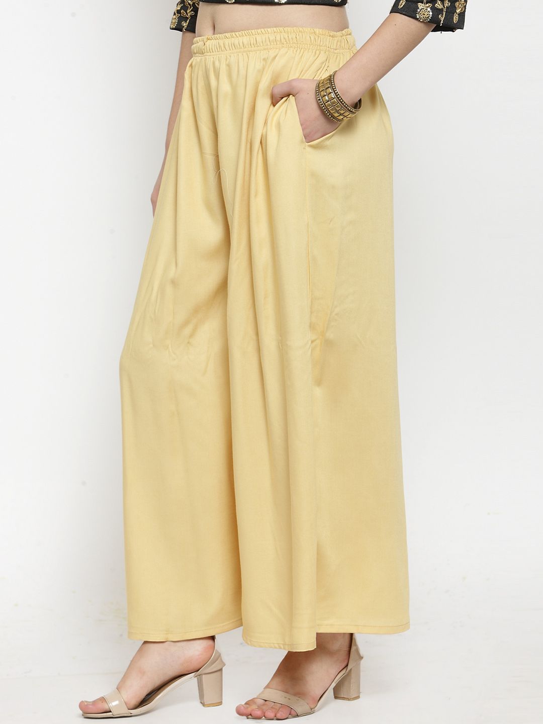 Dhimhi Women's Yellow Solid Flared Palazzos