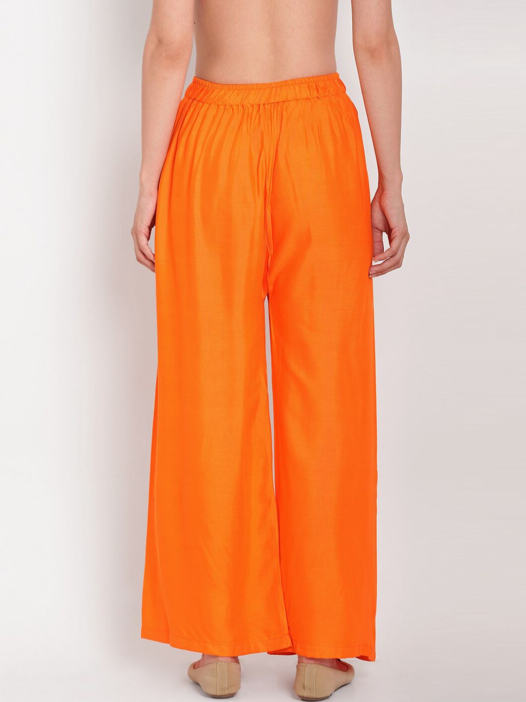 Dhimhi Women's Orange Solid Flared Palazzos