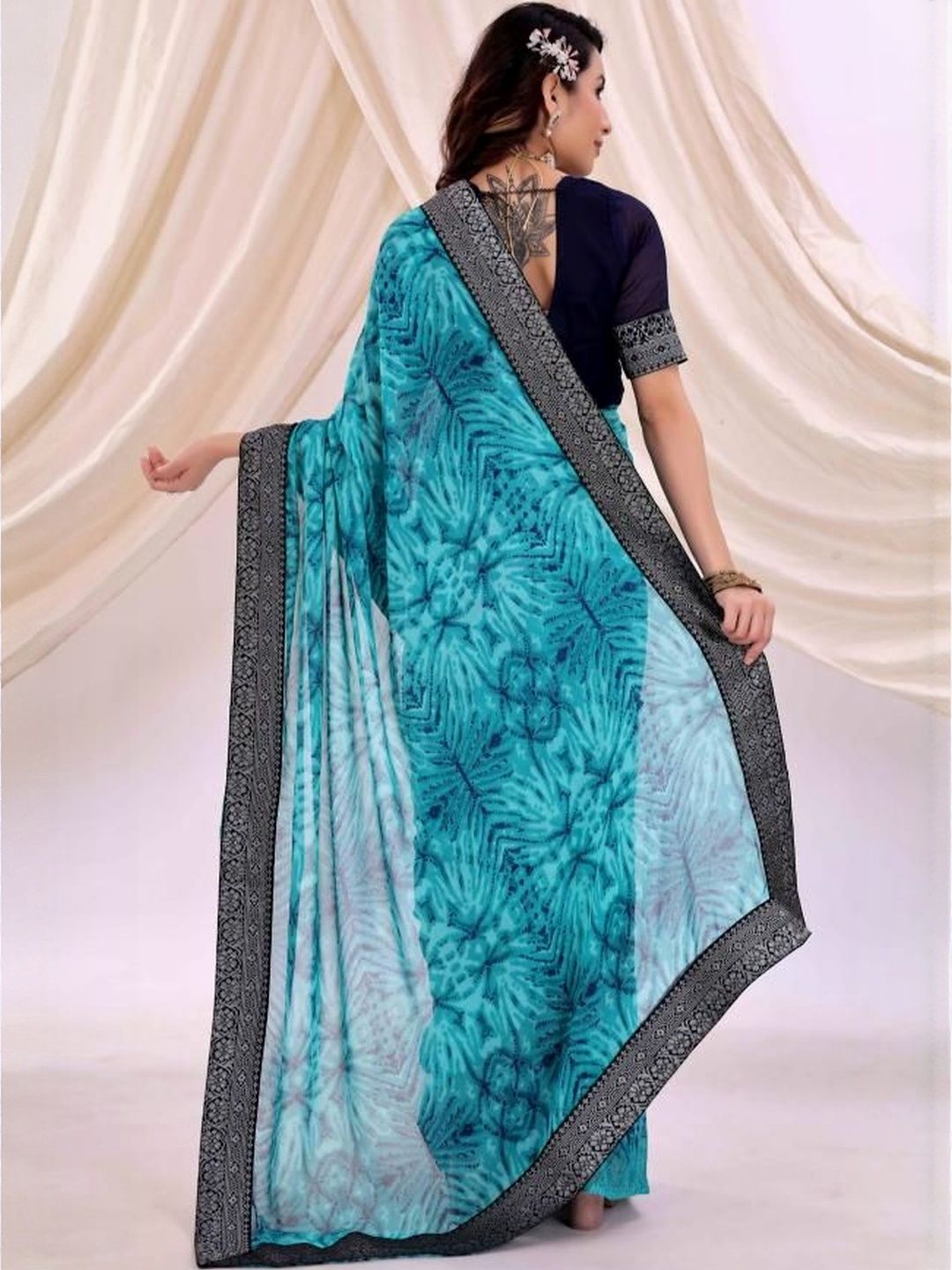 Dhimhi Women's Turquoise Blue Pure Georgette Printed Sarees