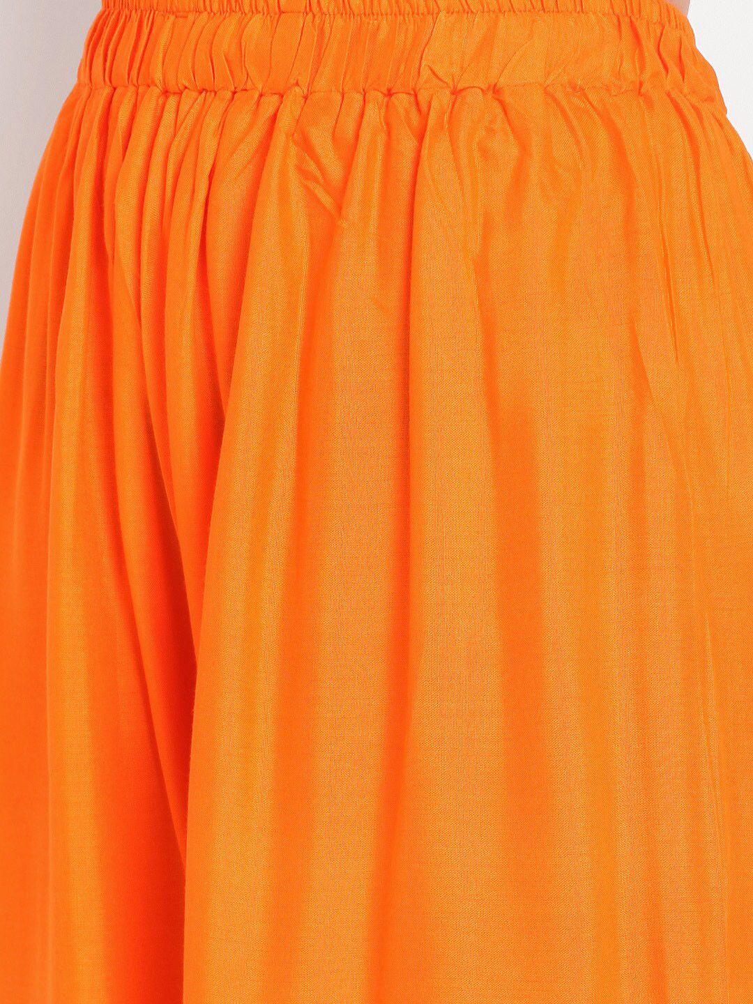 Dhimhi Women's Orange Solid Flared Palazzos