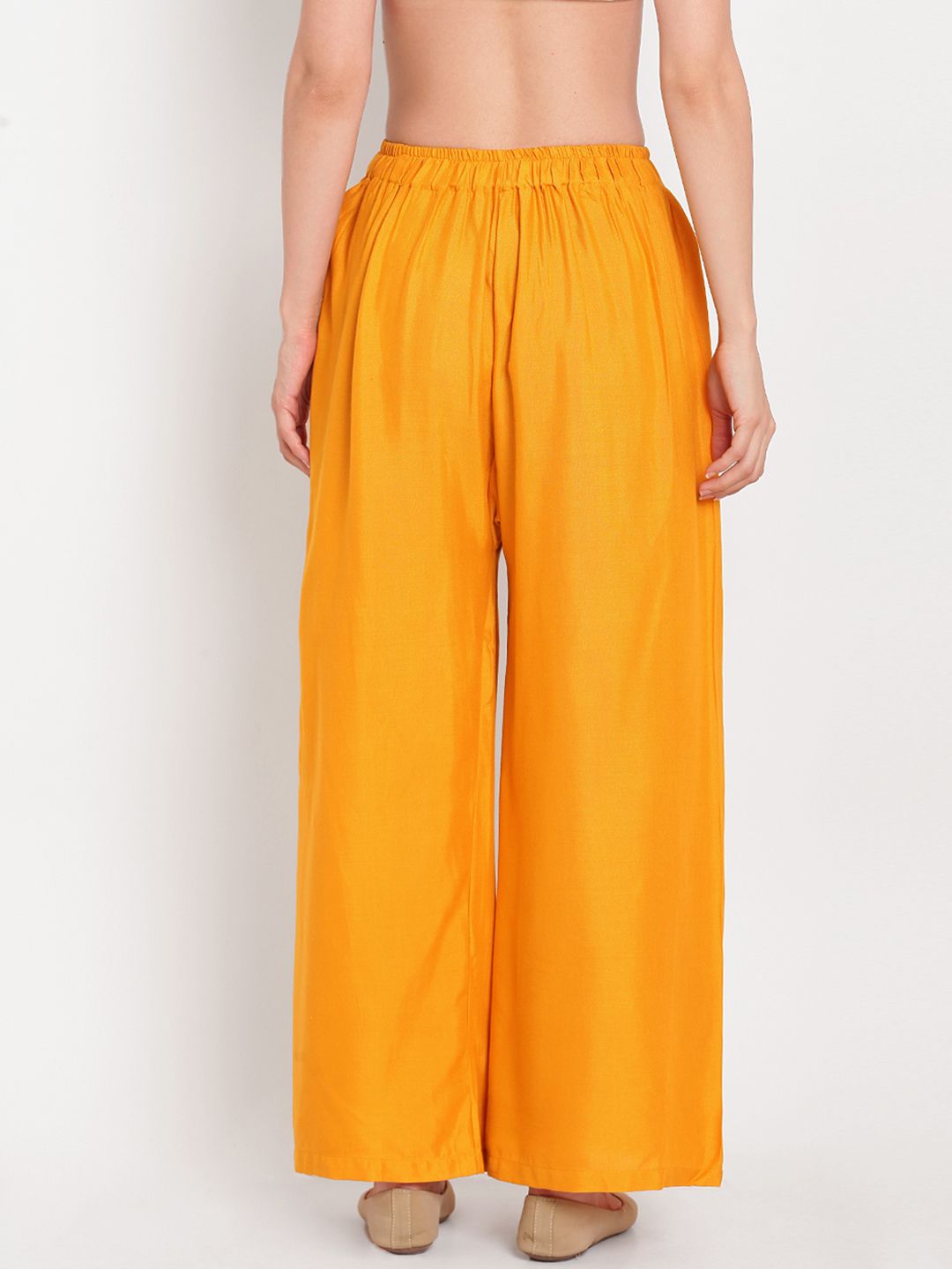 Dhimhi Women's Yellow Solid Flared Palazzos