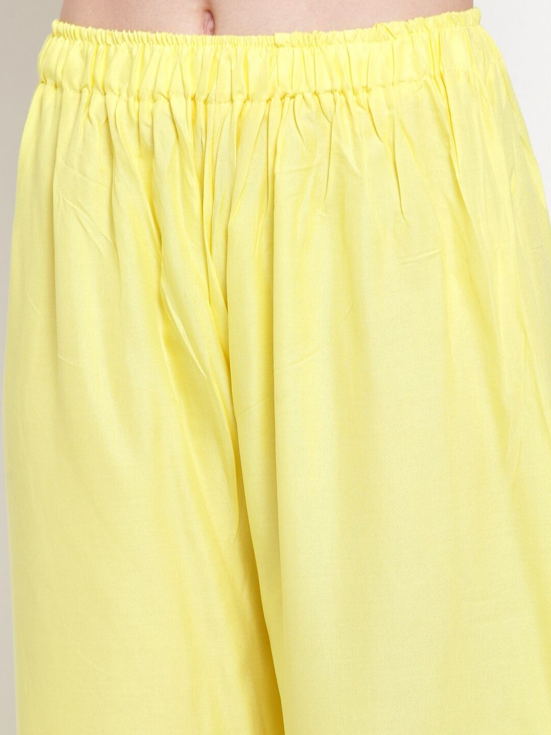 Dhimhi Women's Yellow Solid Flared Ethnic Palazzos