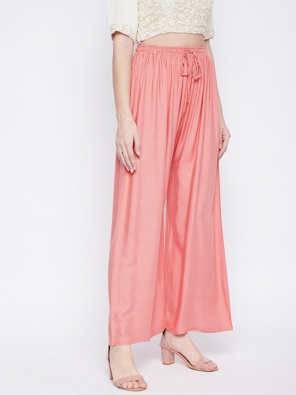 Dhimhi Women's Peach-Coloured Flared Palazzos