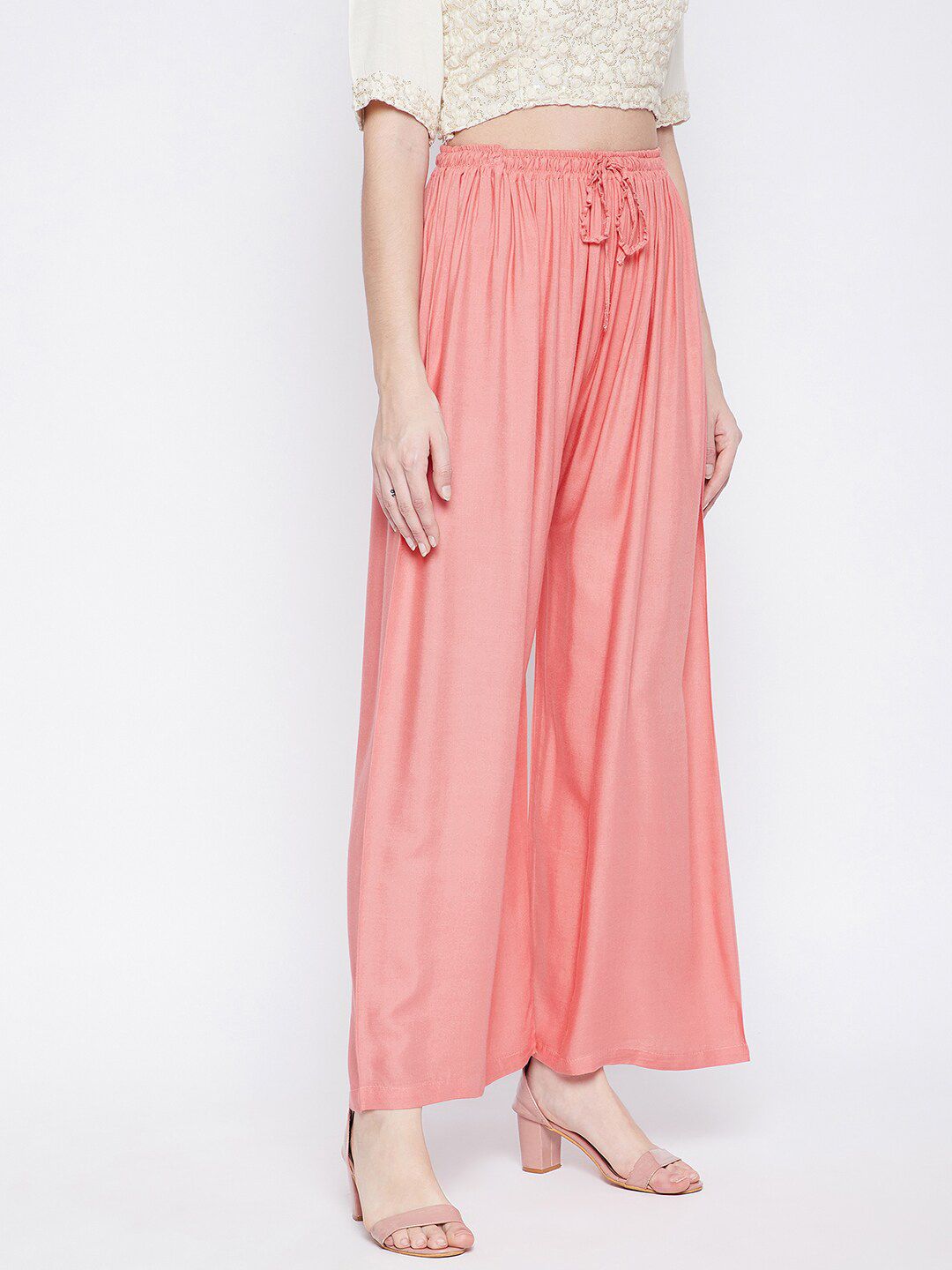 Dhimhi Women's Peach-Coloured Flared Palazzos