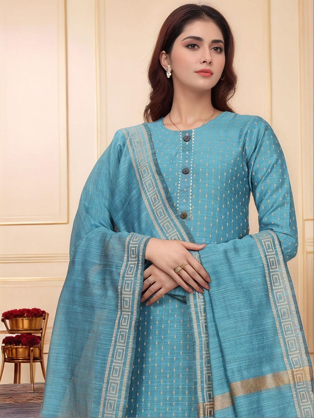 Dhimhi women's regular kurta set with matching trousers and dupatta, featuring traditional embroidery and elegant fabric.