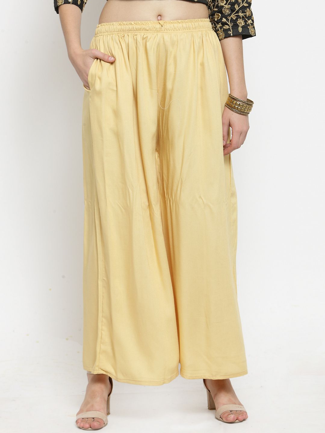 Dhimhi Women's Yellow Solid Flared Palazzos