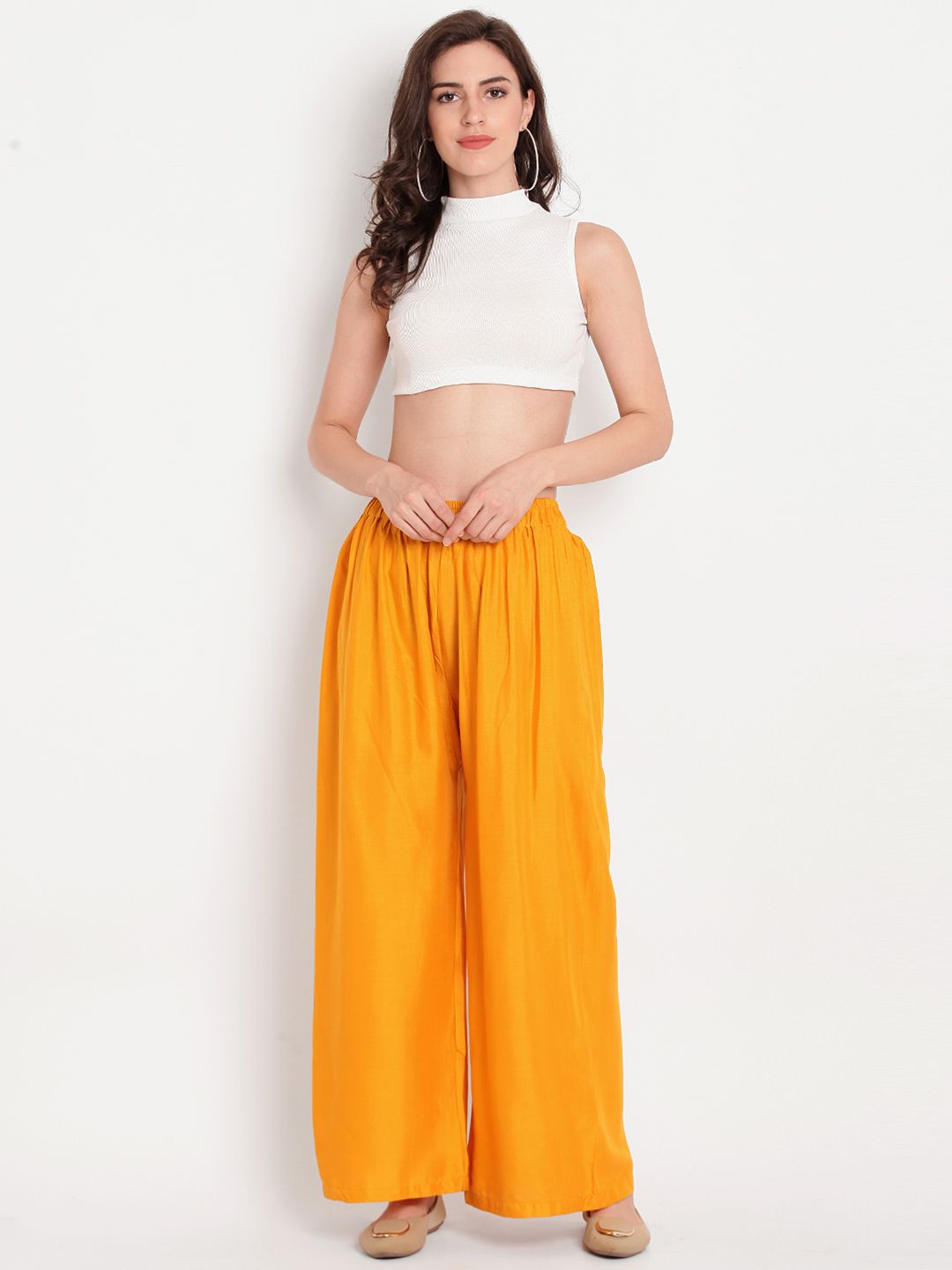 Dhimhi Women's Yellow Solid Flared Palazzos