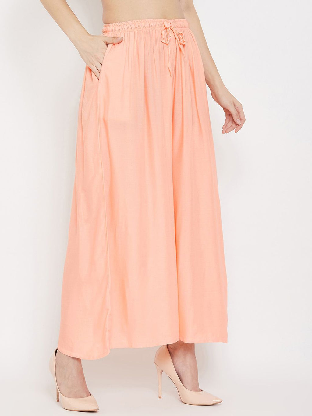 Dhimhi Women's Peach-Coloured Solid Flared Palazzos