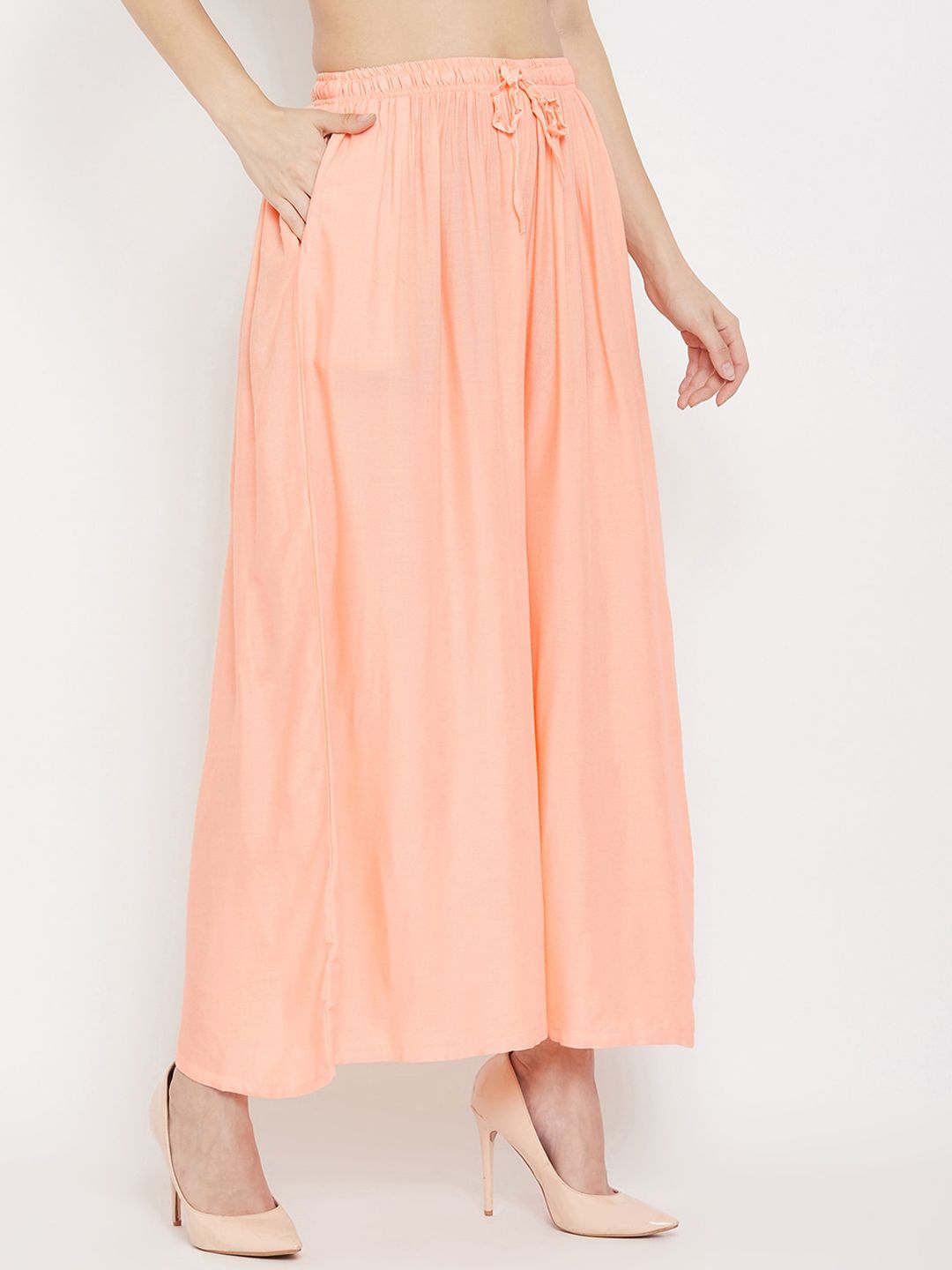 Dhimhi Women's Peach-Coloured Solid Flared Palazzos