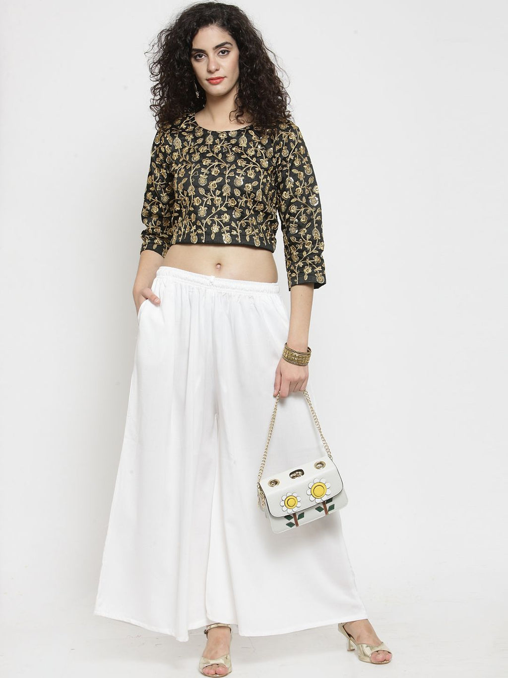 Dhimhi Women's Off-White Solid Flared Palazzos