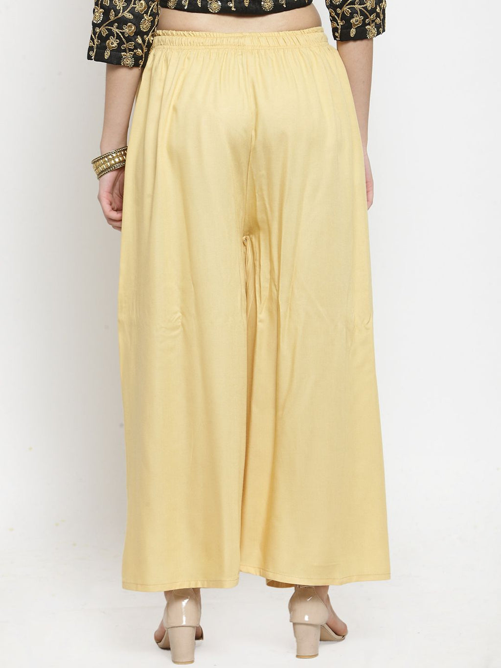 Dhimhi Women's Yellow Solid Flared Palazzos