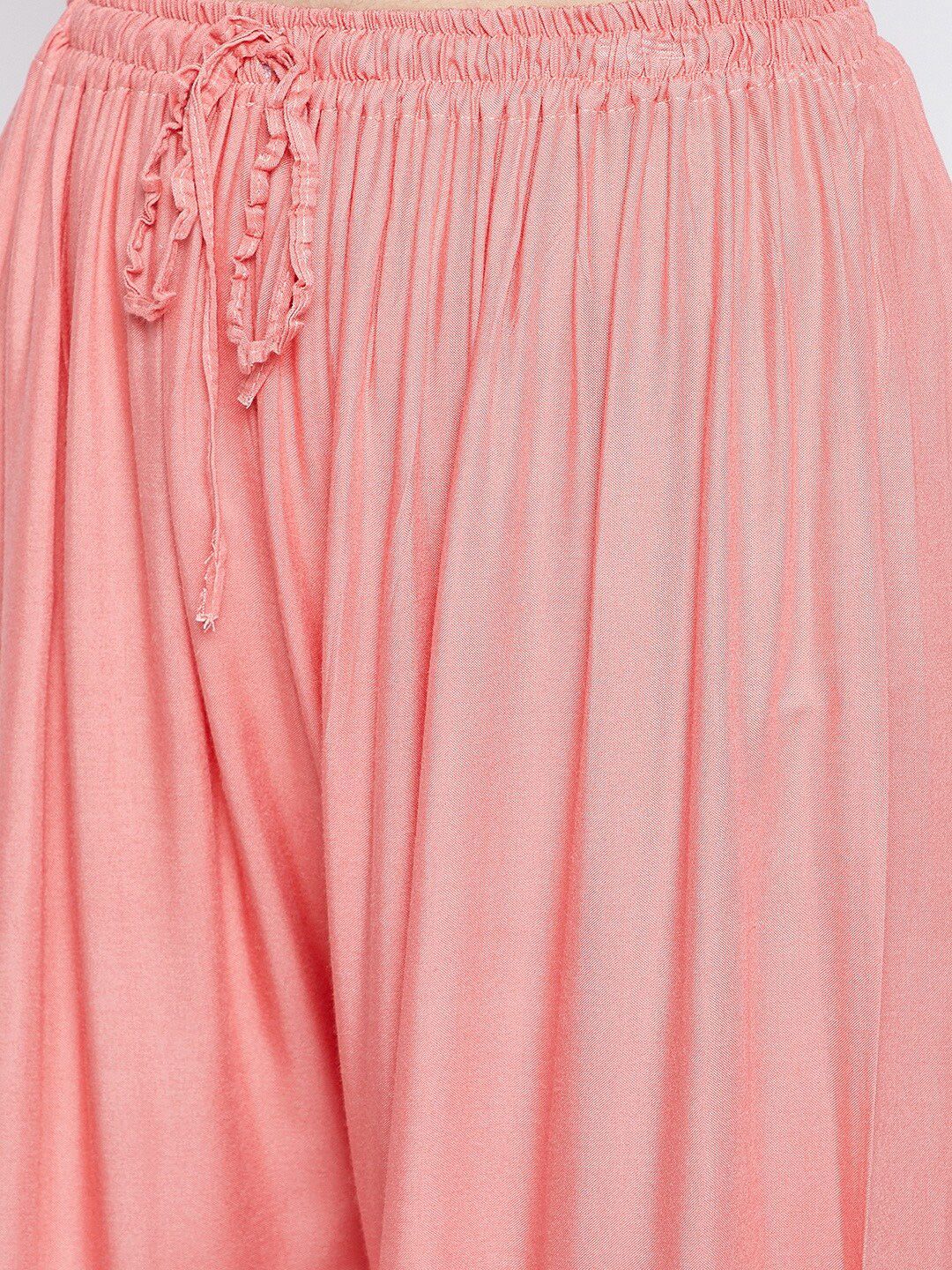 Dhimhi Women's Peach-Coloured Flared Palazzos