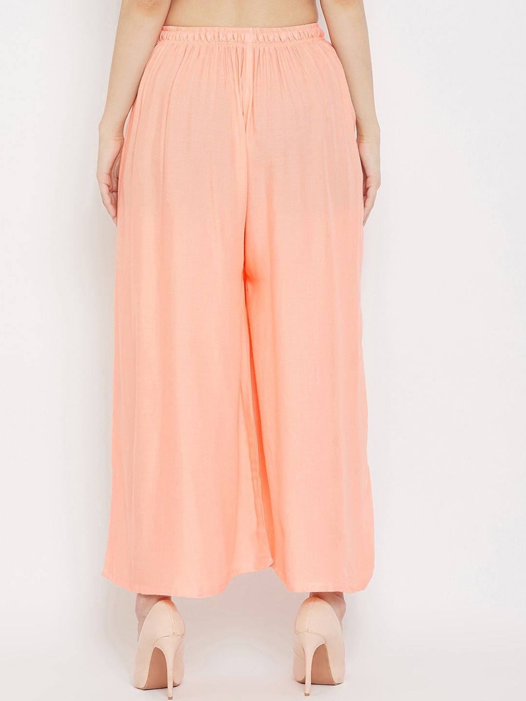 Dhimhi Women's Peach-Coloured Solid Flared Palazzos