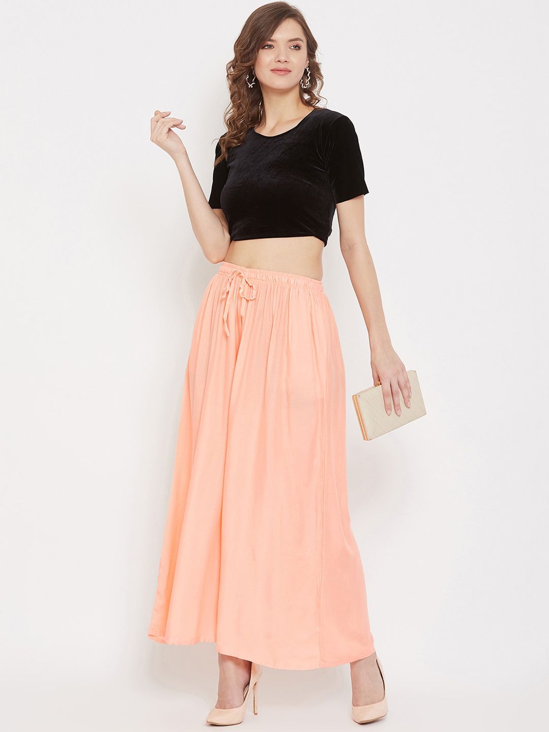 Dhimhi Women's Peach-Coloured Solid Flared Palazzos