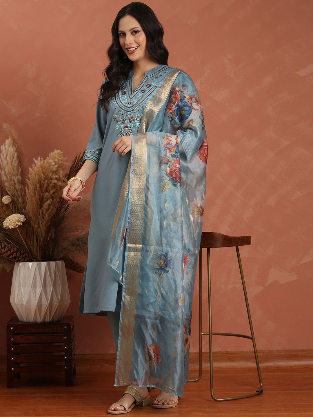 Dhimhi women's floral embroidered kurta set with trousers and dupatta, featuring regular thread work and vibrant design.