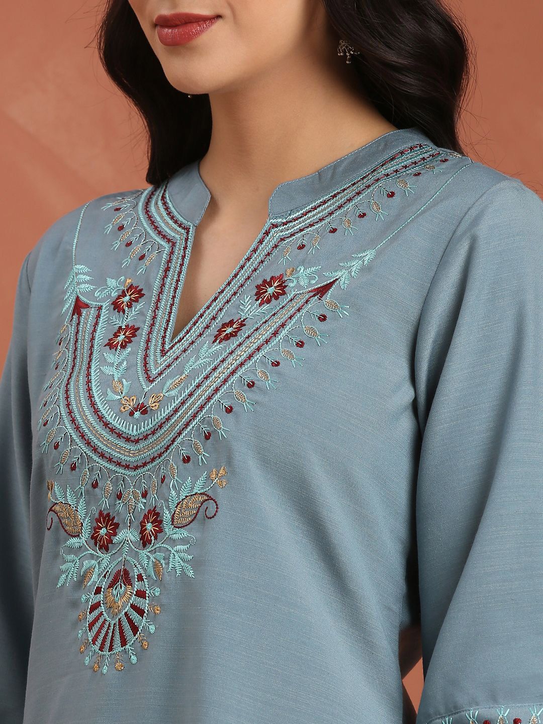 Dhimhi women's floral embroidered kurta set with trousers and dupatta, featuring intricate thread work and vibrant design.