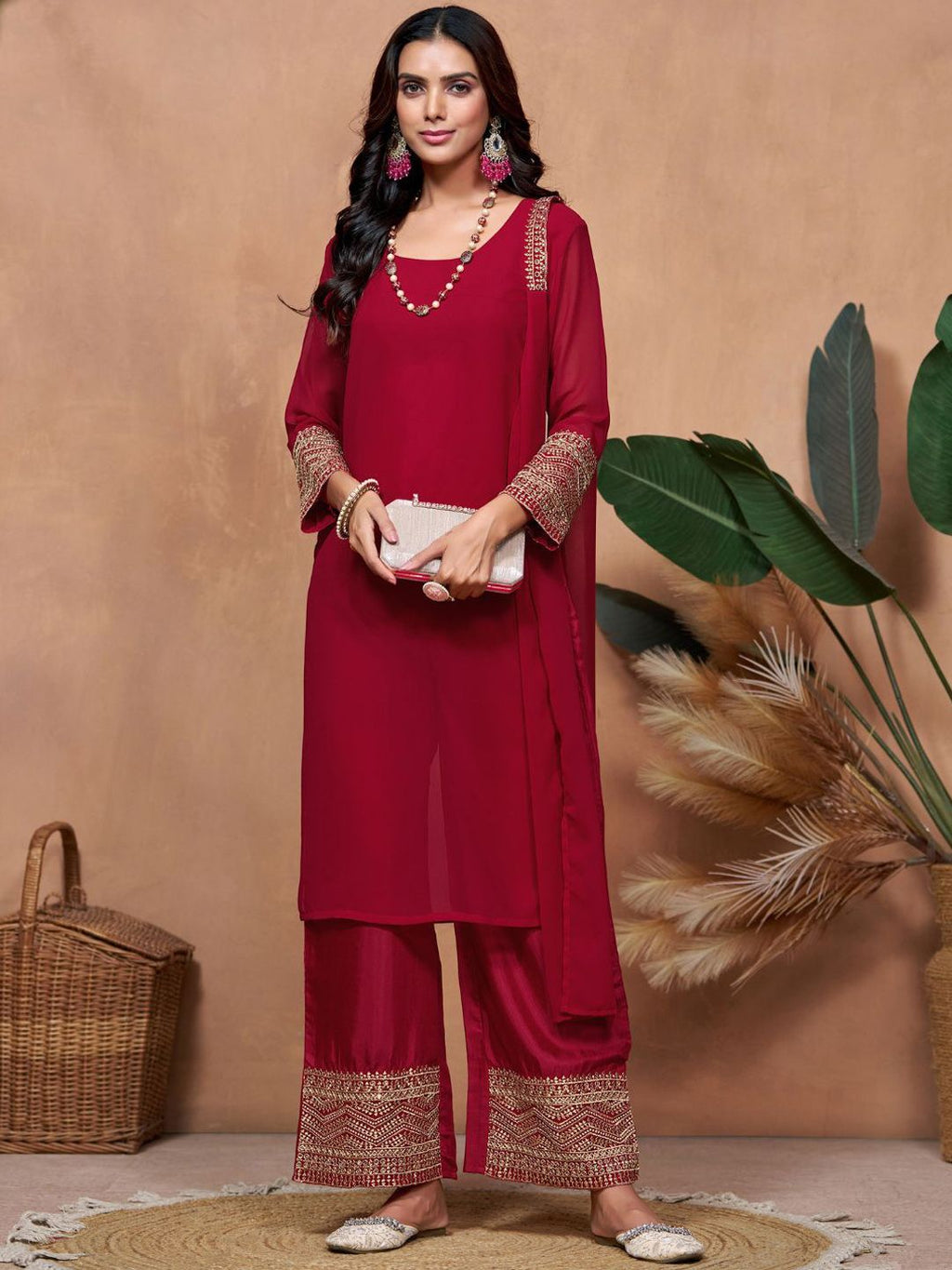 Dhimhi women's embroidered kurta and dupatta set featuring intricate embroidery and traditional design, displayed on a plain background.