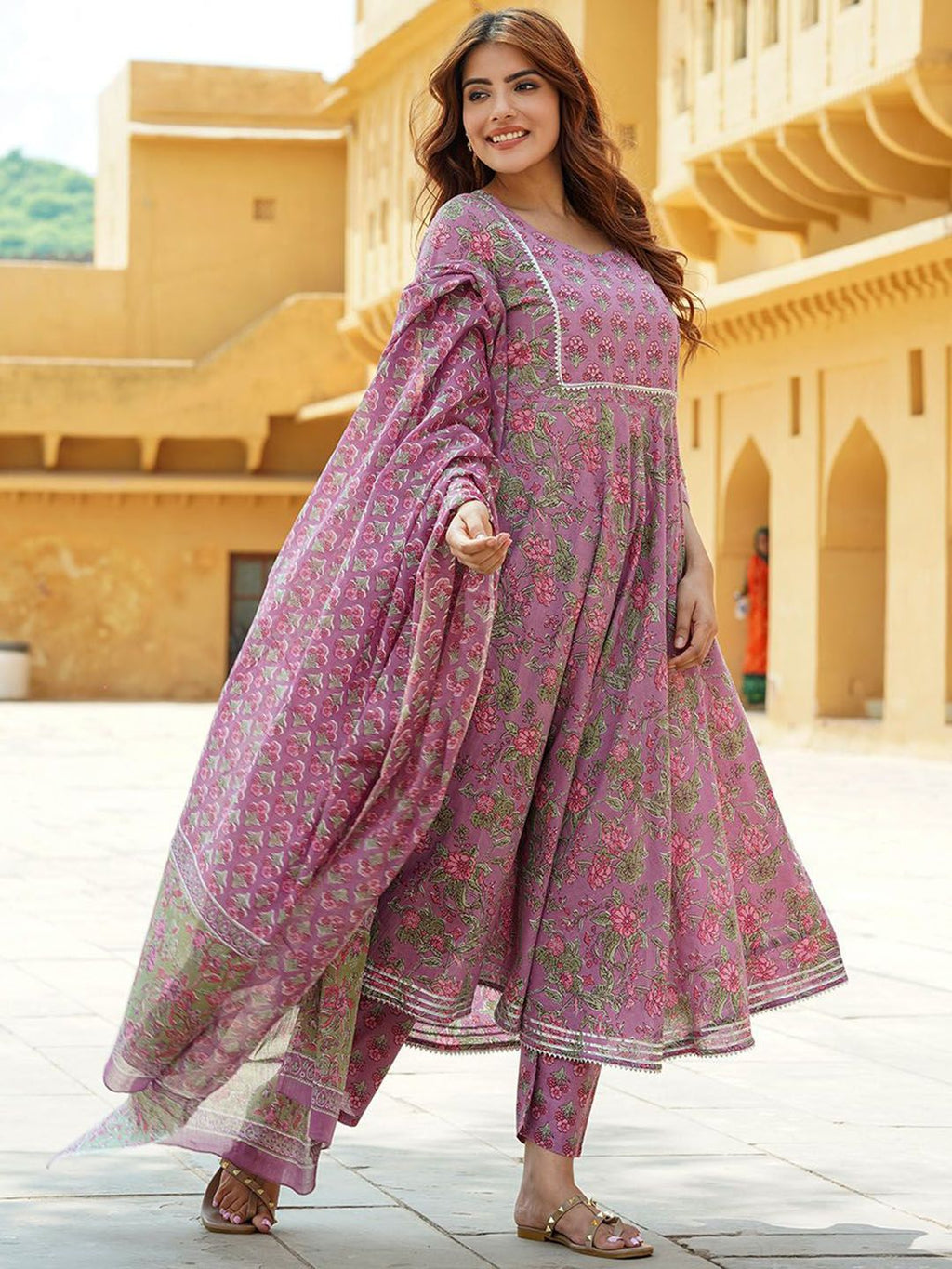 Dhimhi women's floral printed cotton Anarkali kurta set with trousers and dupatta, showcasing vibrant floral patterns and traditional design.