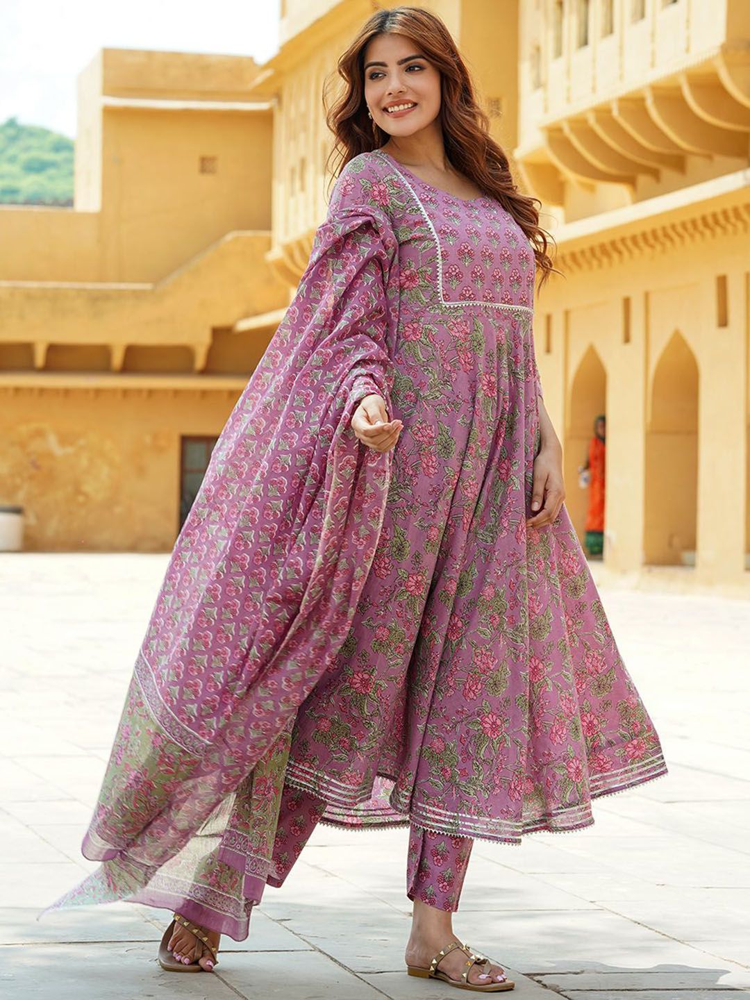 Dhimhi women's floral printed cotton Anarkali kurta set with trousers and dupatta, showcasing vibrant floral patterns and traditional design.