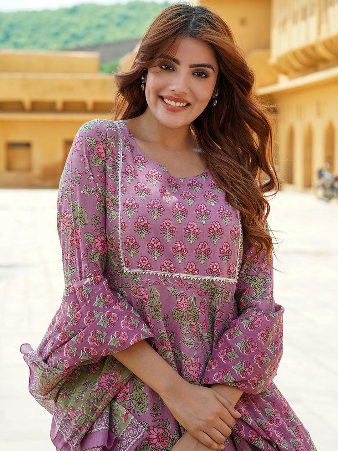 Dhimhi women's floral printed cotton Anarkali kurta set with trousers and dupatta, featuring vibrant floral patterns and traditional design.