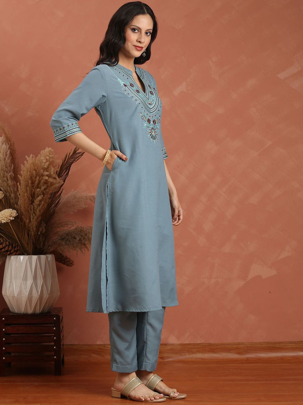 Dhimhi women's floral embroidered kurta set with trousers and dupatta, featuring regular thread work and intricate design.