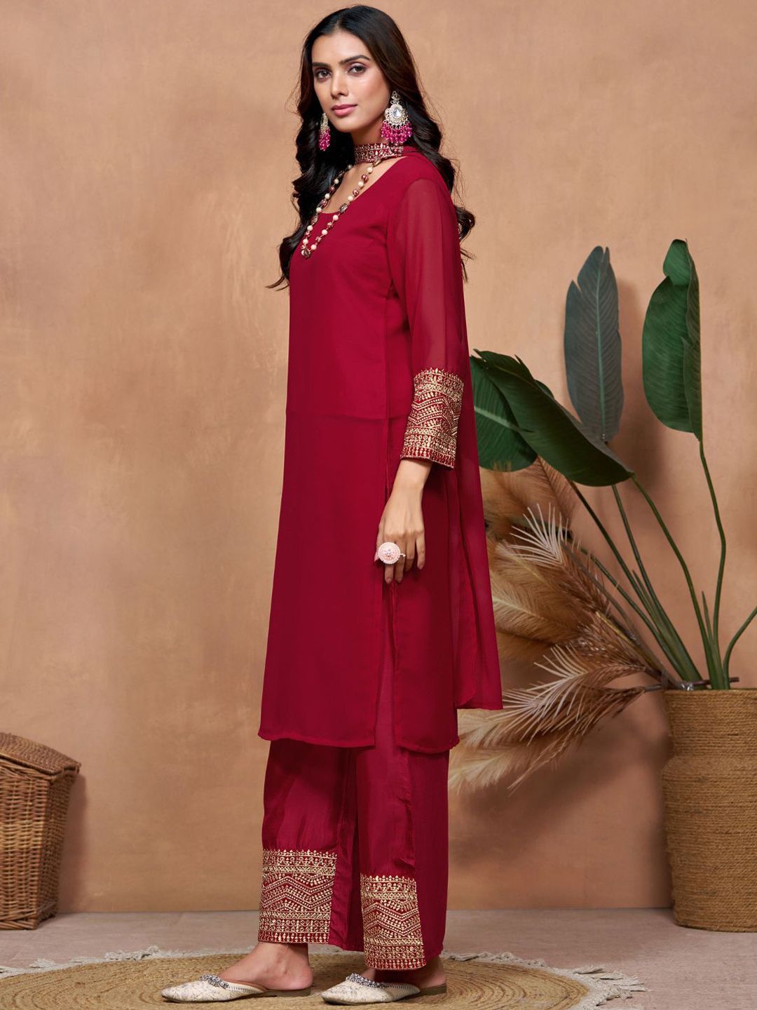 Dhimhi women's embroidered kurta and dupatta set with intricate embroidery, traditional design, and vibrant fabric.