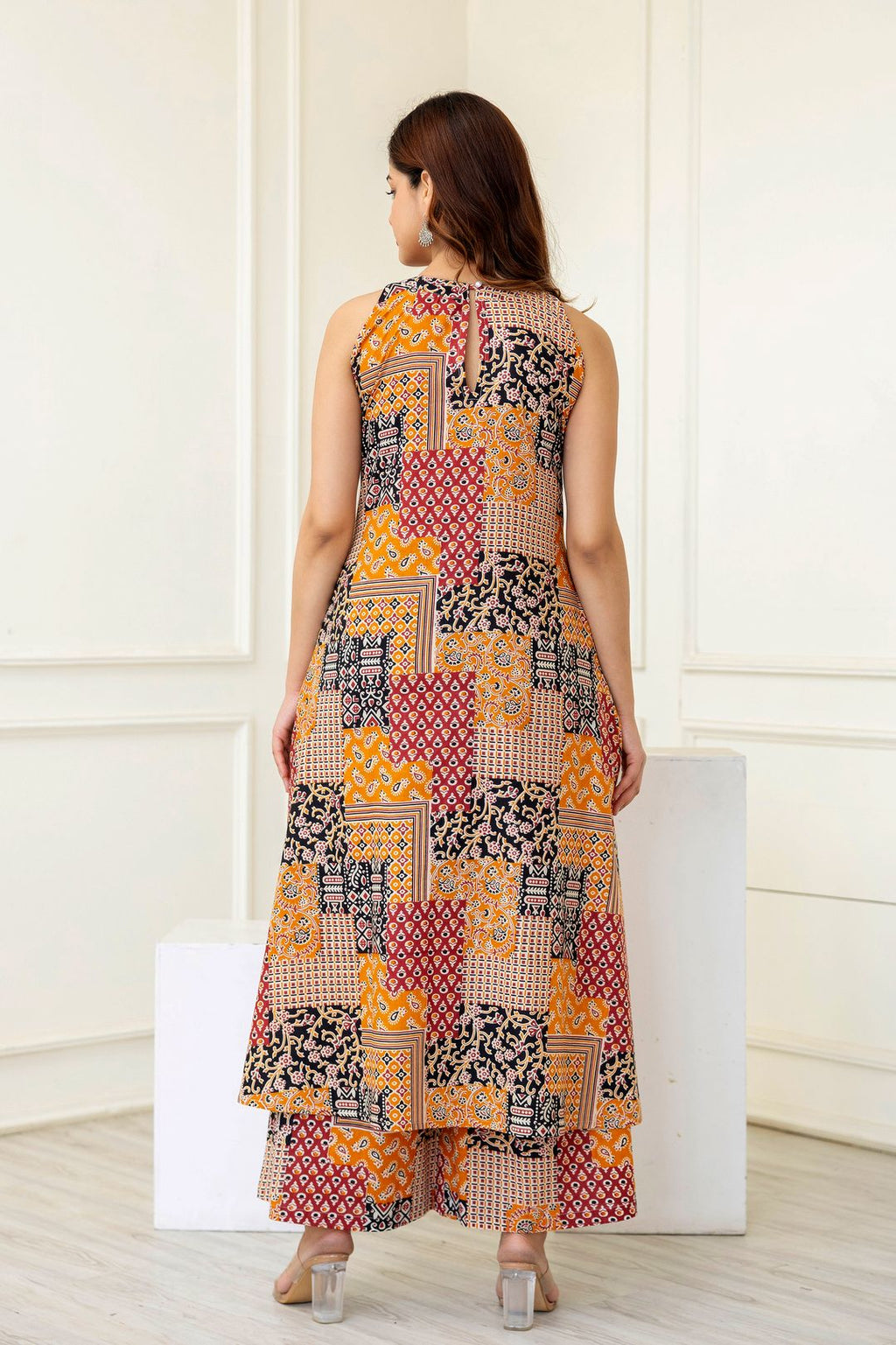 Dhimhi women's geometric printed round neck A-line kurta with matching palazzos, stylish and comfortable ethnic wear set.