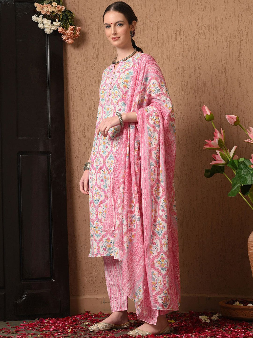 Dhimhi women's floral printed cotton kurta set with matching trousers and dupatta, featuring vibrant floral design and comfortable fabric.