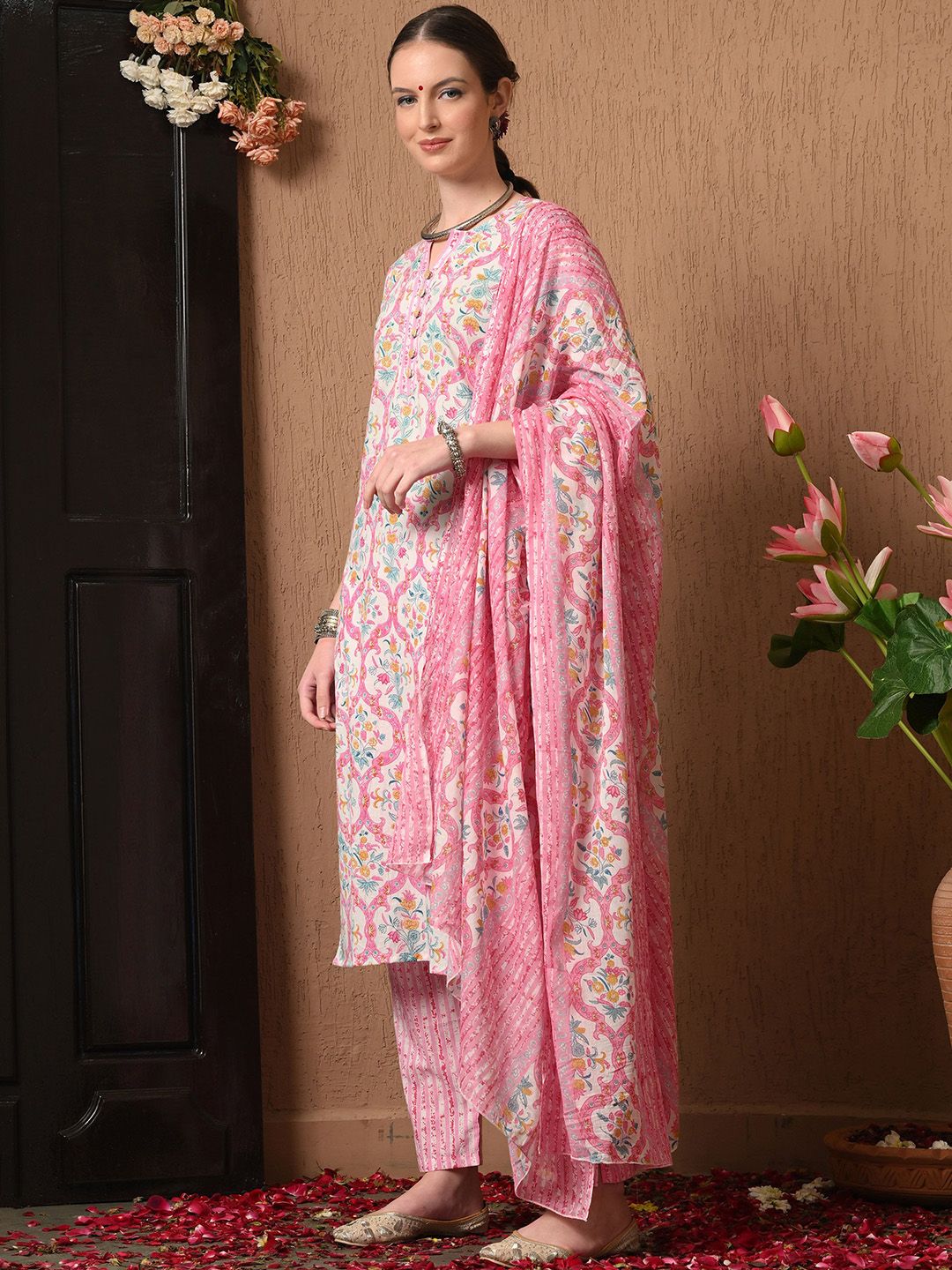Dhimhi women's floral printed cotton kurta set with matching trousers and dupatta, featuring vibrant floral design and comfortable fabric.