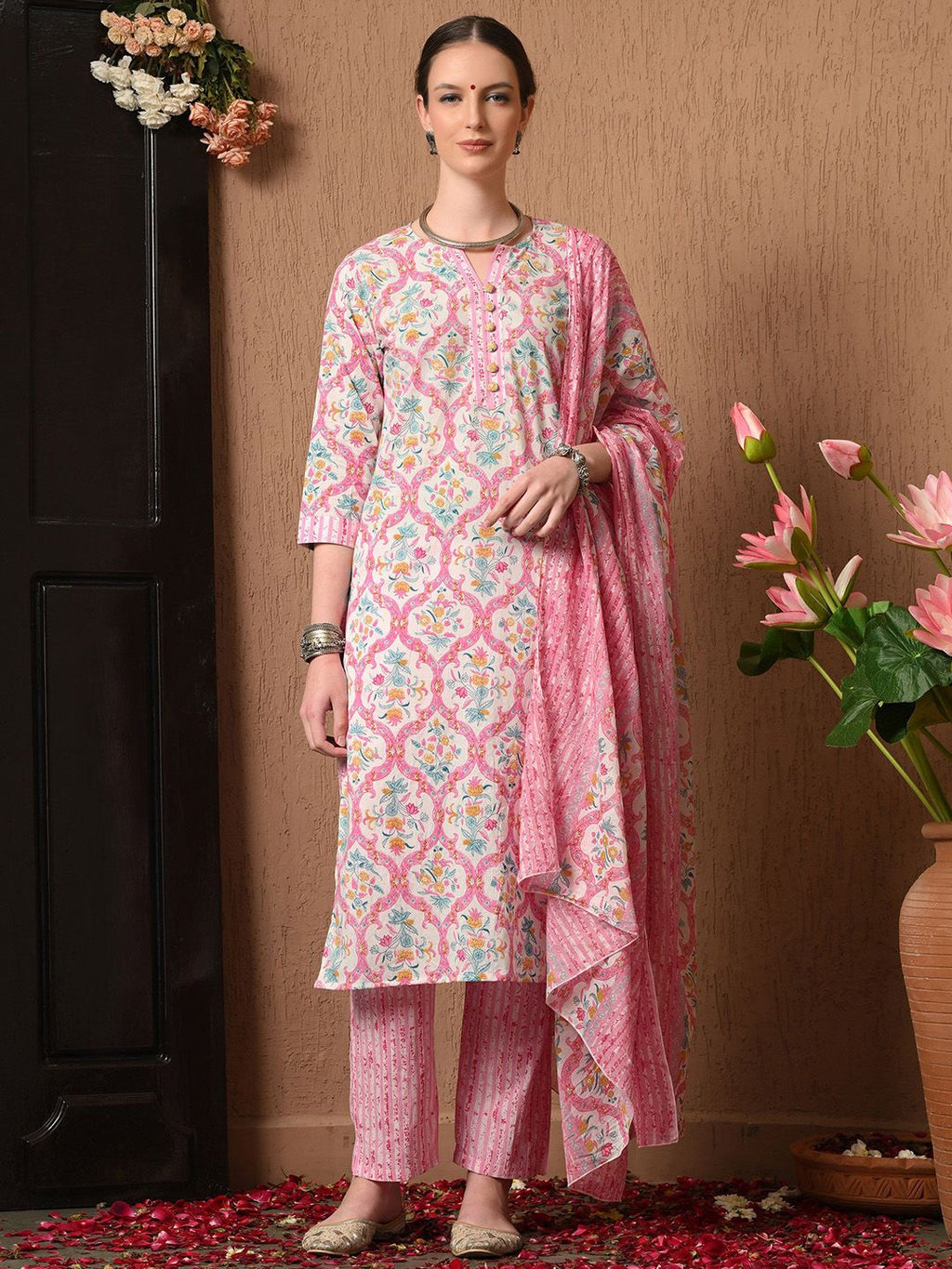 Dhimhi women's floral printed cotton kurta set with matching trousers and dupatta, showcasing vibrant floral design and comfortable fit.