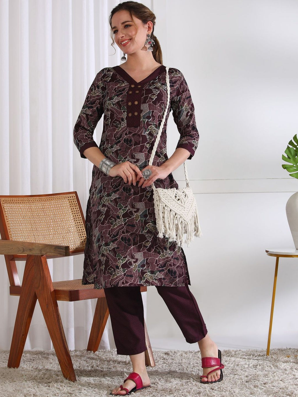 Dhimhi women's ethnic motifs printed kurta set with matching trousers, featuring traditional design and comfortable fit.