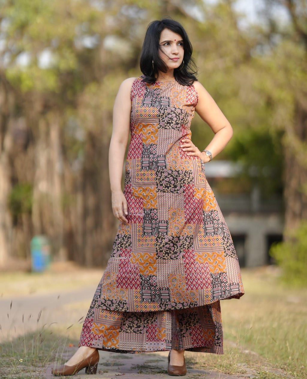 Dhimhi women's geometric printed round neck A-line kurta with matching palazzos, stylish traditional Indian kurta set.
