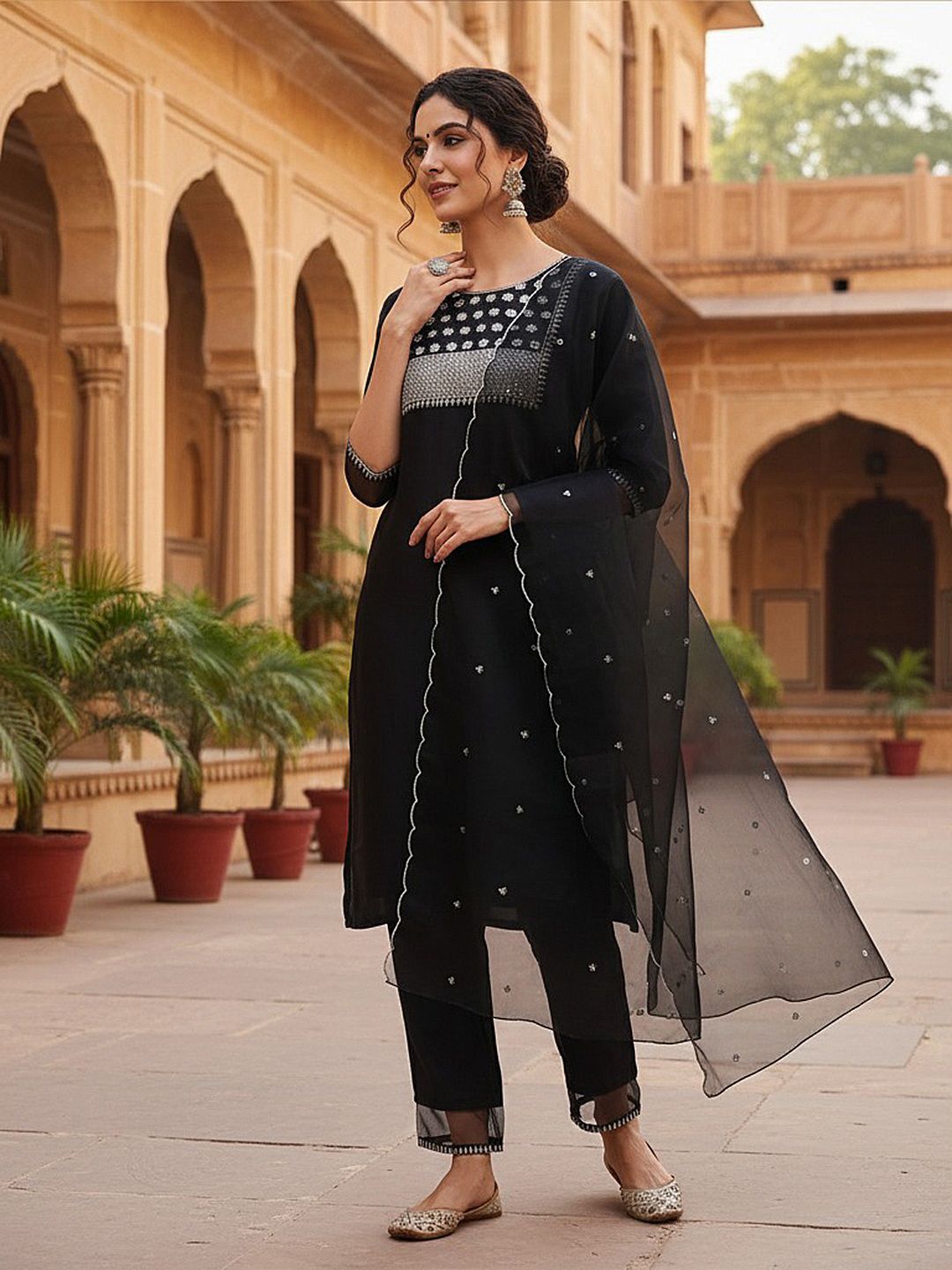 Dhimhi women's ethnic motifs kurta set with yoke design, sequins, matching trousers, and dupatta, traditional Indian attire.