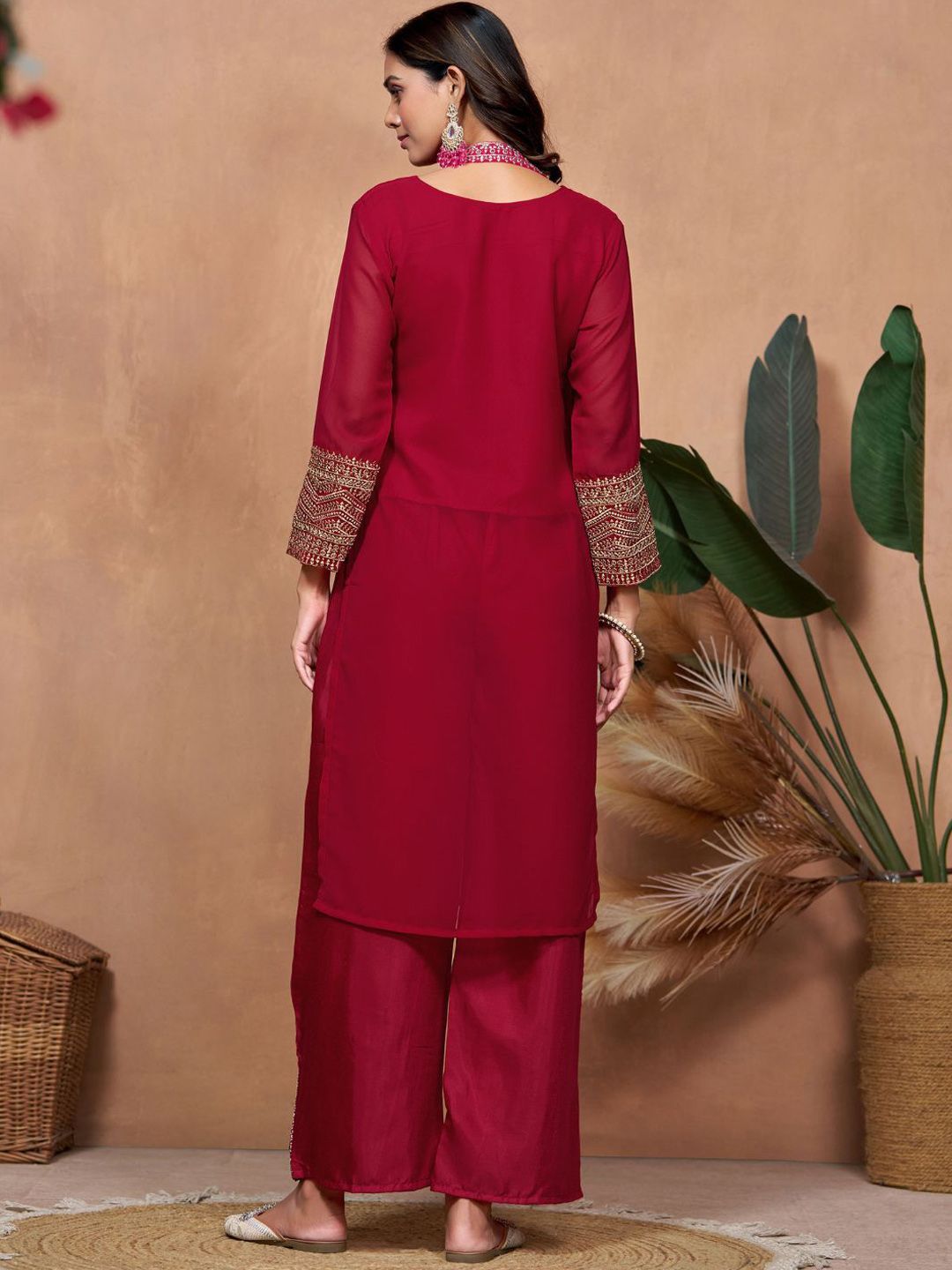 Dhimhi women's embroidered kurta and dupatta set with intricate floral embroidery and matching dupatta, suitable for festive occasions.