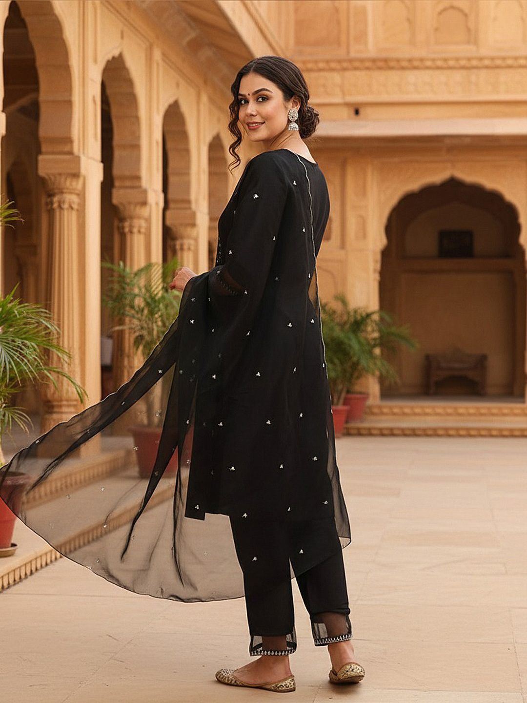 Dhimhi women's ethnic motifs yoke design sequinned kurta set with matching trousers and dupatta, featuring intricate embroidery.