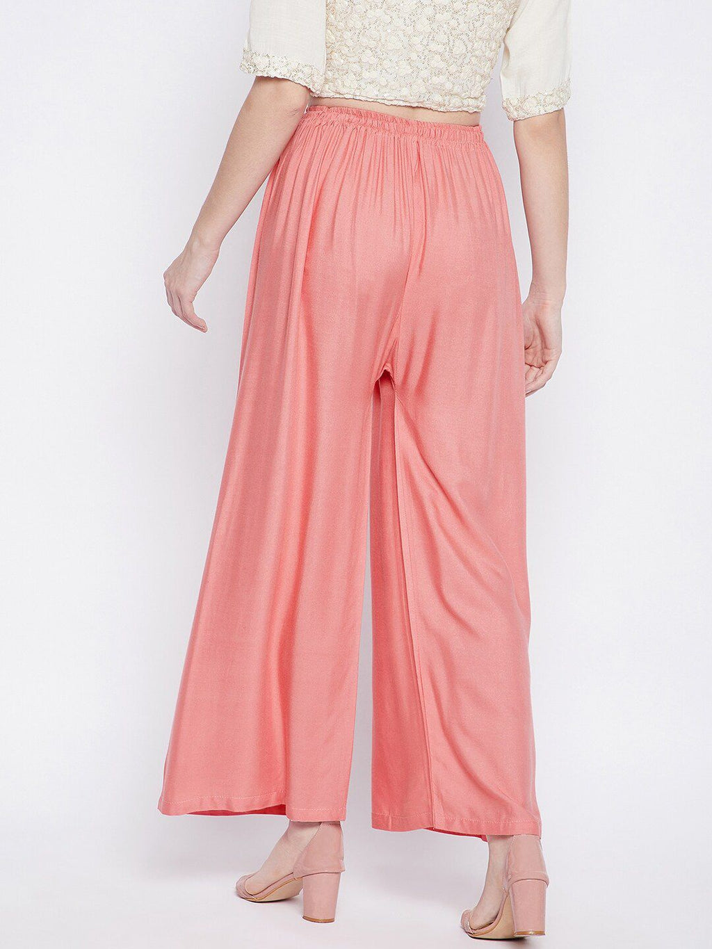 Dhimhi Women's Peach-Coloured Flared Palazzos