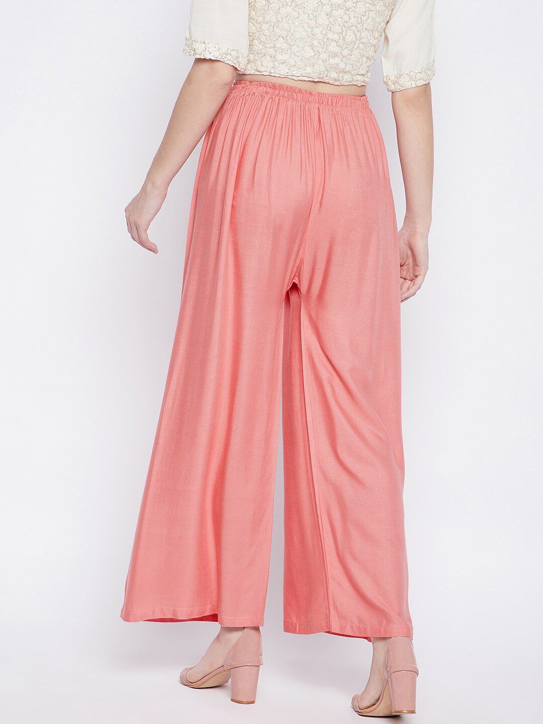 Dhimhi Women's Peach-Coloured Flared Palazzos
