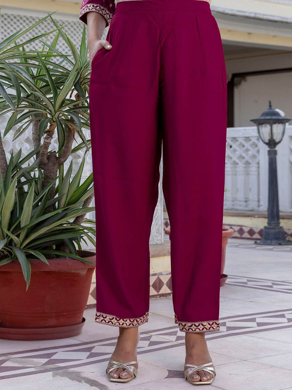 Dhimhi women's paisley embroidered sequinned straight kurta set with matching trousers and dupatta, featuring intricate embroidery and embellishments.