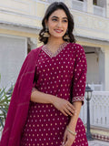 Dhimhi women's paisley embroidered sequinned straight kurta with matching trousers and dupatta, showcasing intricate embroidery and embellishments.