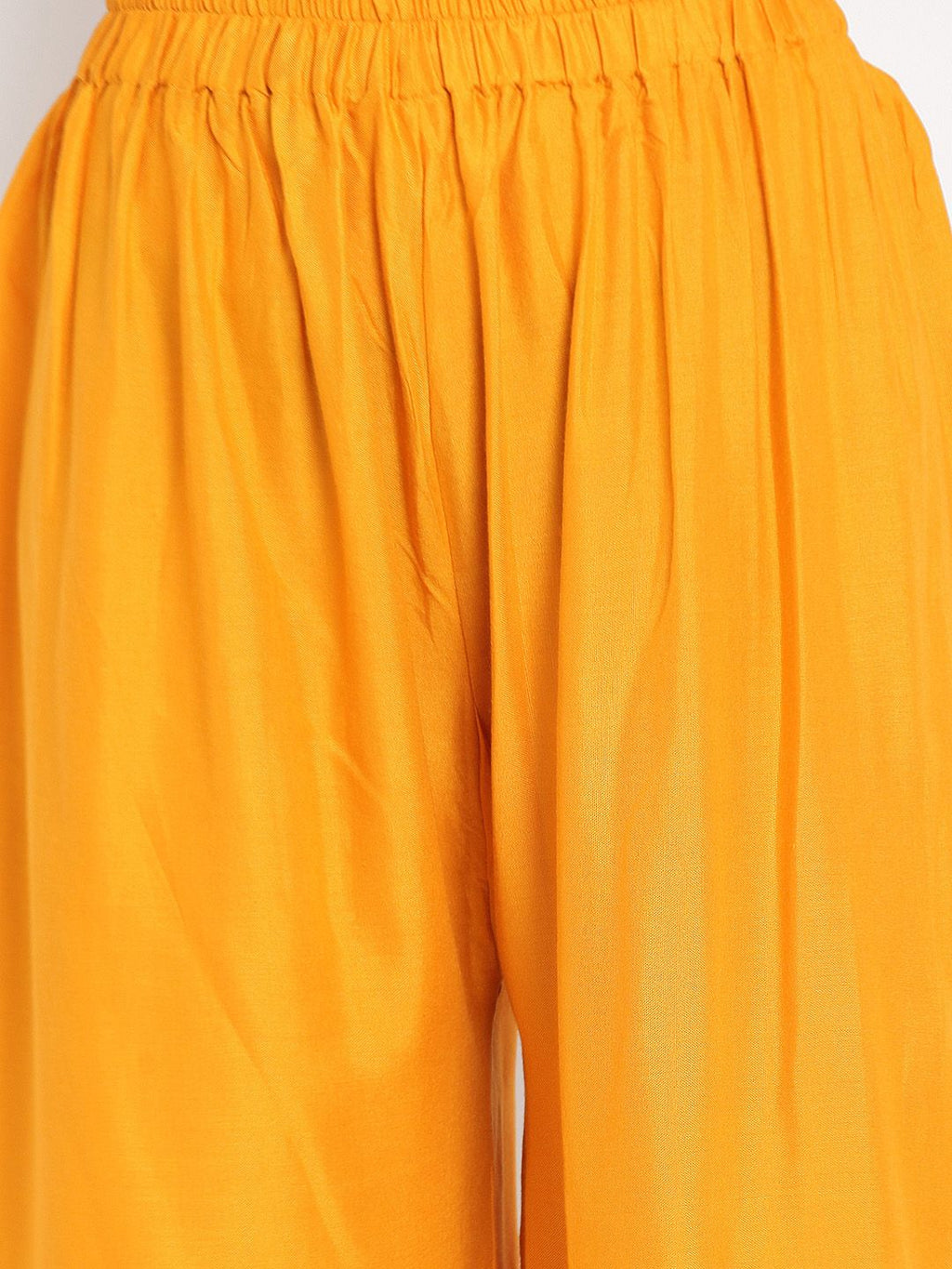 Dhimhi Women's Yellow Solid Flared Palazzos