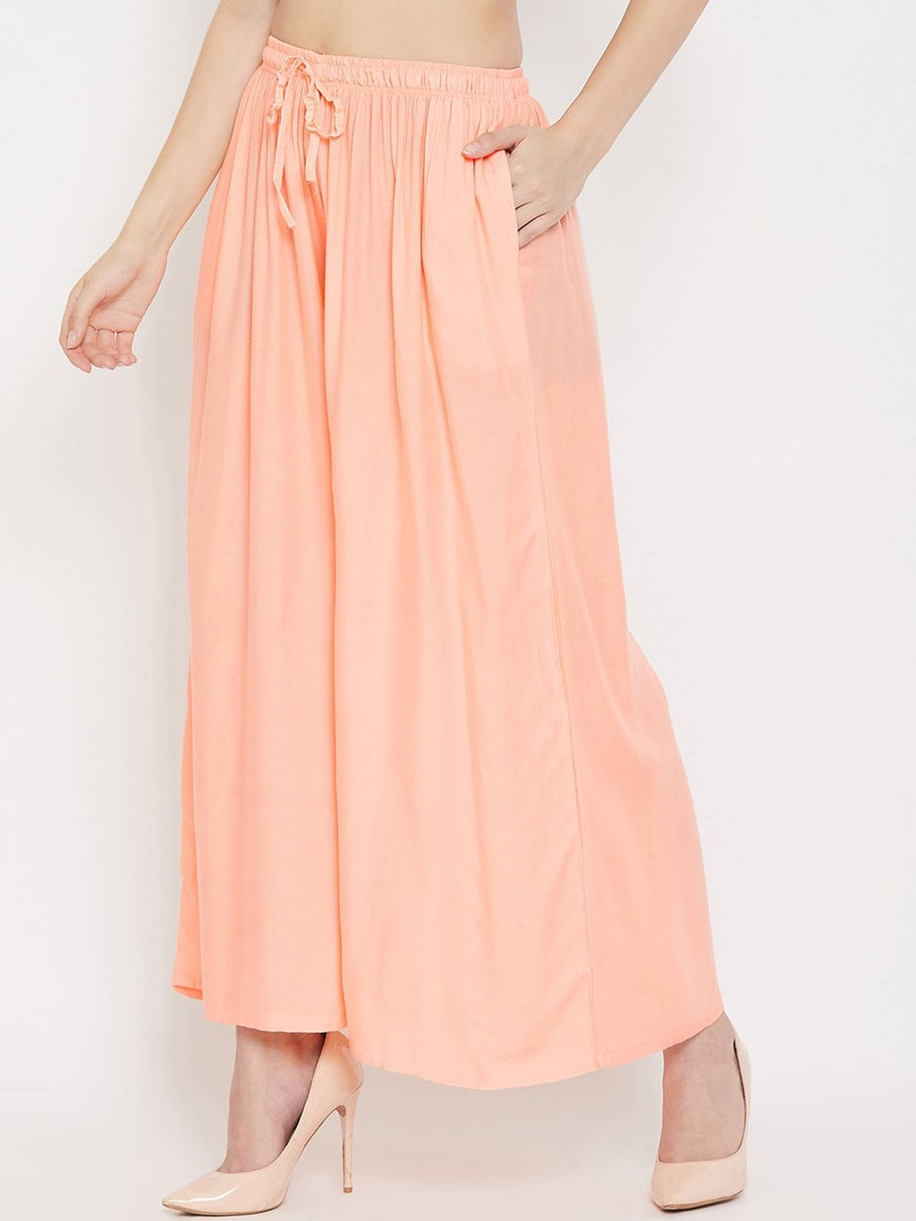 Dhimhi Women's Peach-Coloured Solid Flared Palazzos