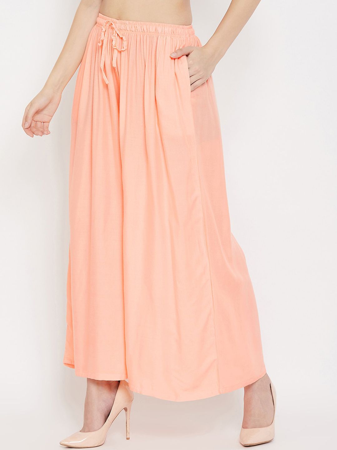 Dhimhi Women's Peach-Coloured Solid Flared Palazzos