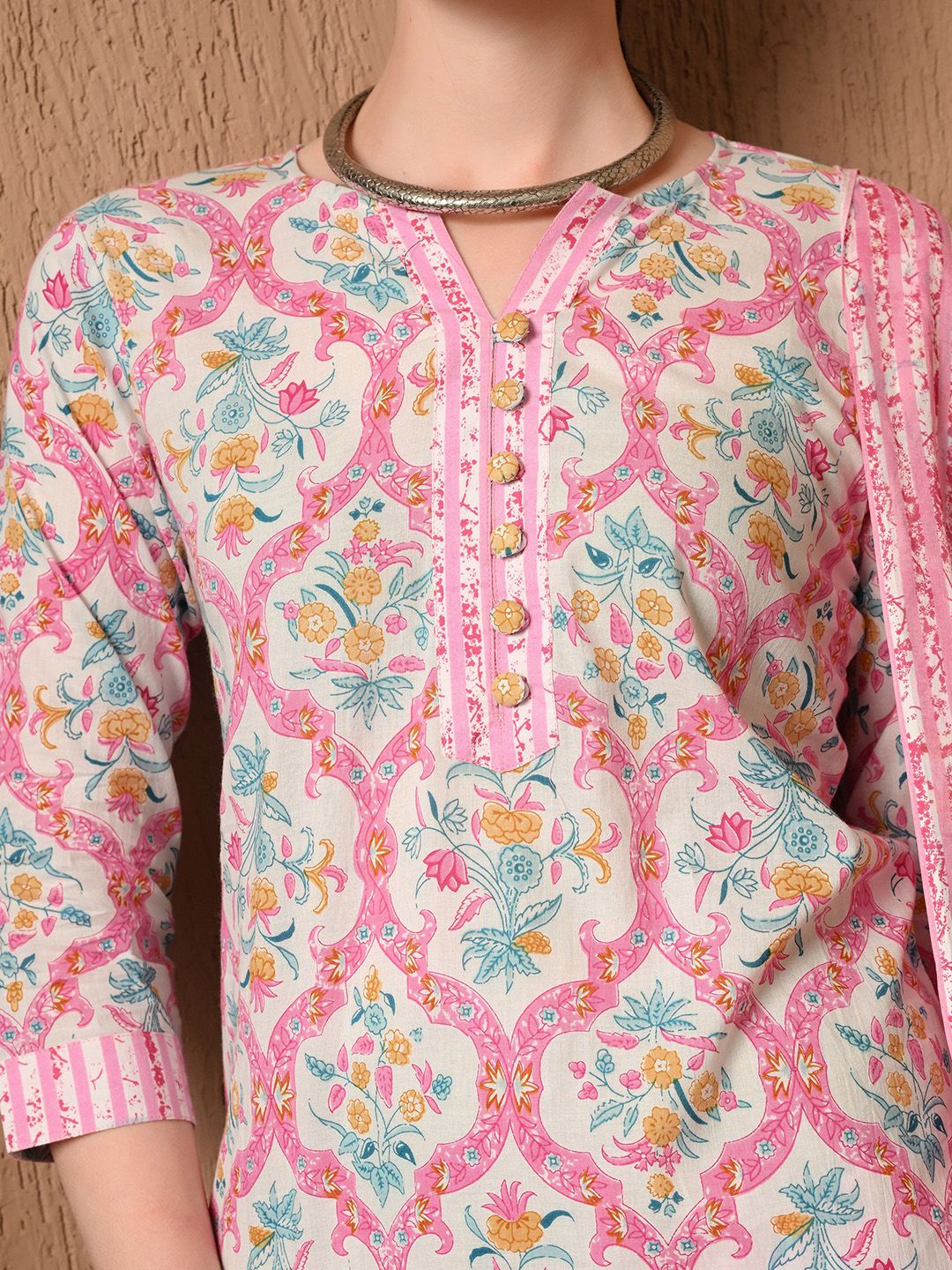 Dhimhi women's floral printed cotton kurta set with matching trousers and dupatta, featuring vibrant floral design and comfortable fit.