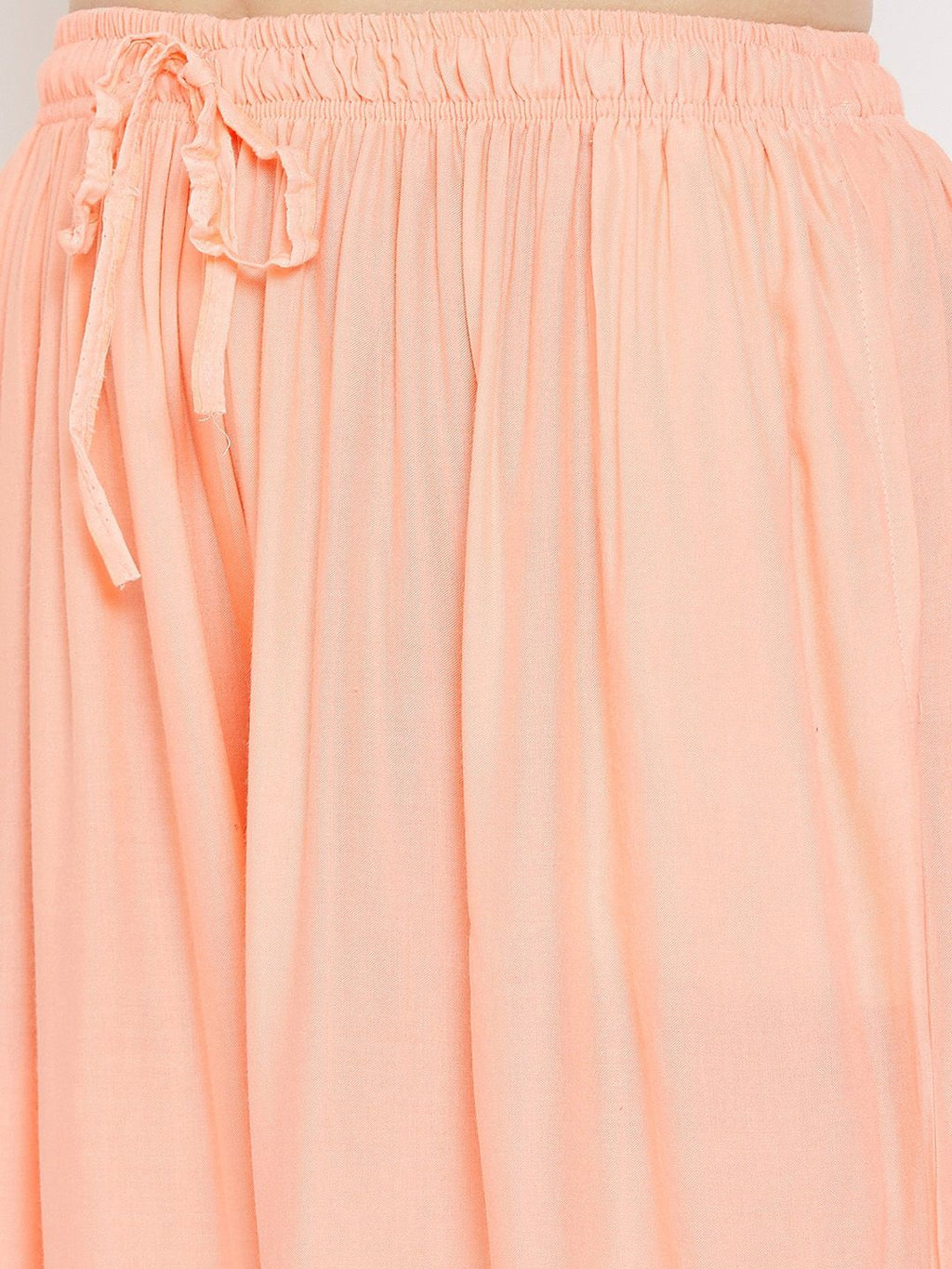 Dhimhi Women's Peach-Coloured Solid Flared Palazzos