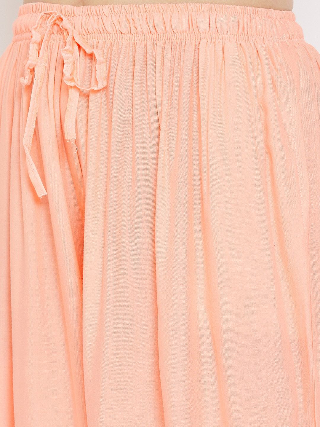 Dhimhi Women's Peach-Coloured Solid Flared Palazzos
