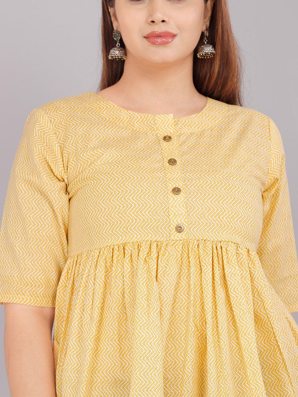 Dhimhi Women's Yellow Solid Pure Cotton Peplum Top