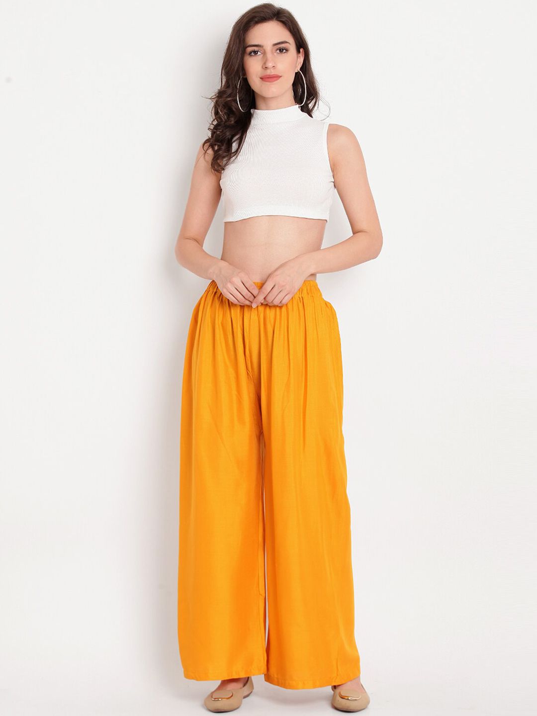 Dhimhi Women's Mustard Yellow Solid Flared Palazzos