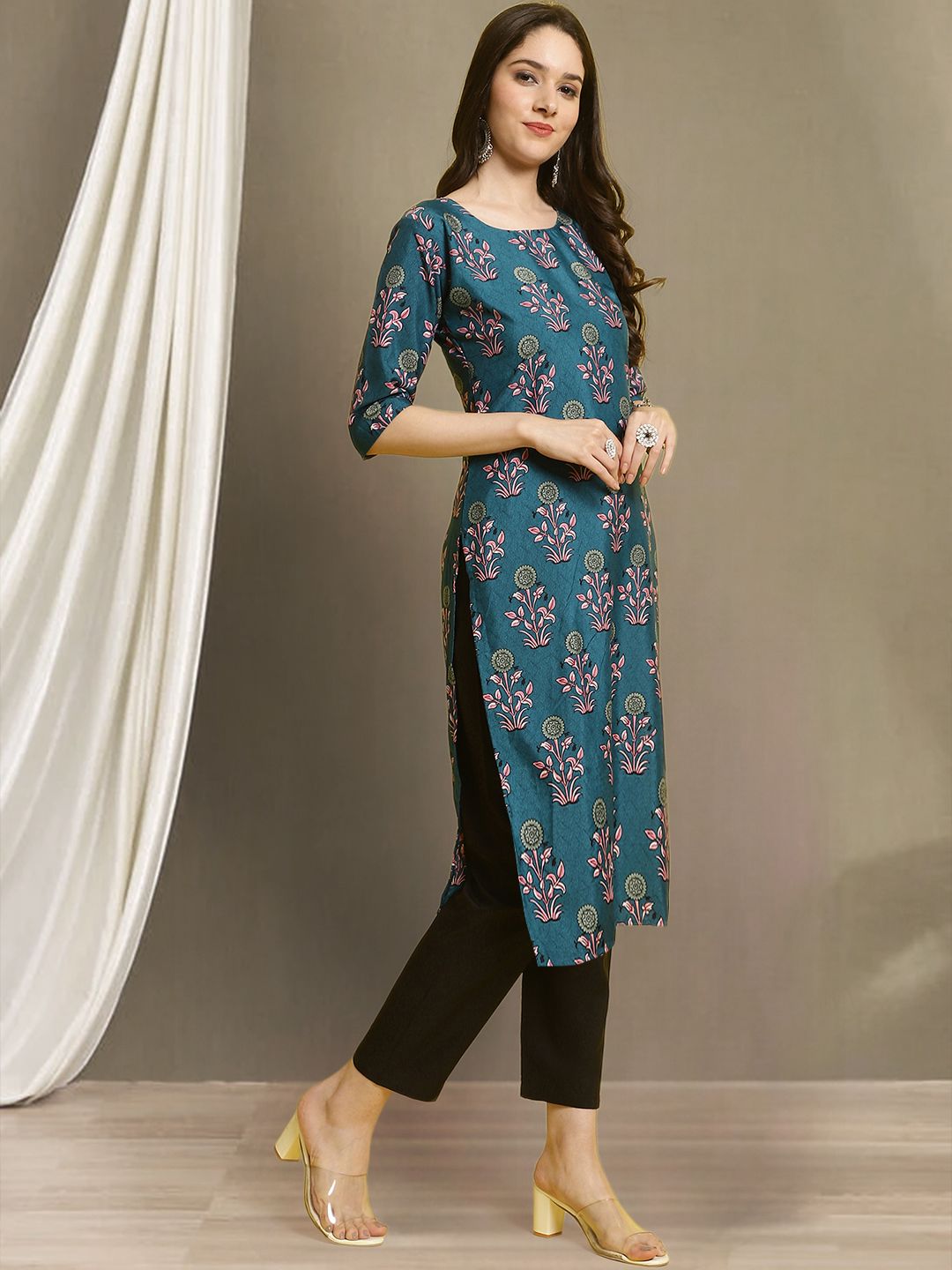 Dhimhi women's ethnic motifs printed round neck kurta with matching trousers, straight fit, traditional Indian style.